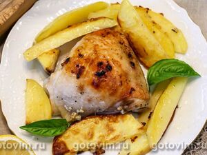 Куриные бедра, запеченные в соусе из сливочного масла с чесноком и лимоном