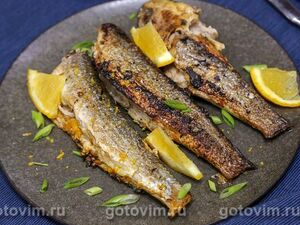 Кефаль, жаренная с апельсином и чесноком